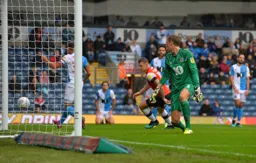 The Blackburn defence realise James Collins' effort has hit the back of the net