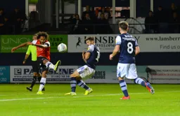 Izzy Brown fires in a shot from the edge of the box