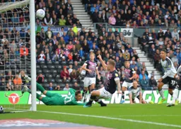 James Collins misses an absolute sitter as James Bree, Harry Cornick and former Hatter Curtis Davies watch on
