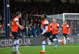 The Town players are delighted for Pelly, who has scored his first goal in the Championship