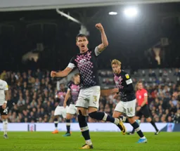 Dan Potts celebrates as he pulls one back for the Hatters