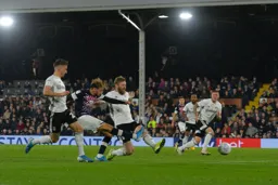 Harry Cornick gets in between Joe Bryan and Tim Ream to fire in a shot