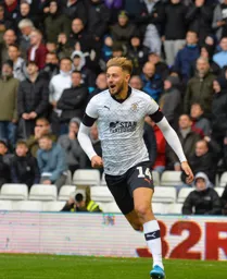 Harry Cornick celebrating levelling for the Hatters