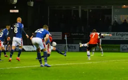 Callum McManaman has a dig from the edge of the box to score a consolation goal