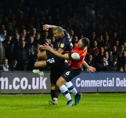 Matty Pearson gets into a tangle with Darren Pratley