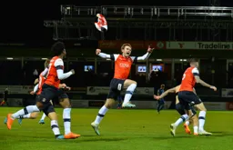 Callum McManaman showing the joy of everyone at Kenilworth Road with that late turnaround