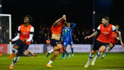 Pure happiness from the Town as George Moncur whips his shirt off