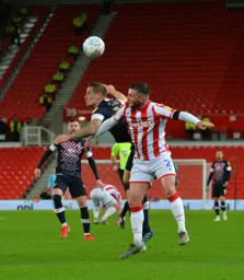 James Collins battling in the air with Thomas Edwards