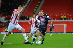 Harry Cornick running at Ryan Shawcross