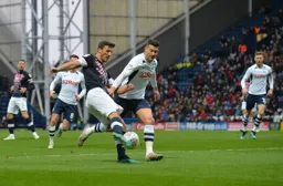 Matty Pearson whipping in a cross