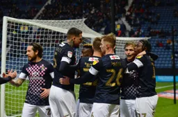 The team celebrating James Collins' equaliser