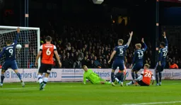 The Fulham defence pleading for handball, but James Collins' goal will stand, putting the Hatters 2-1 ahead