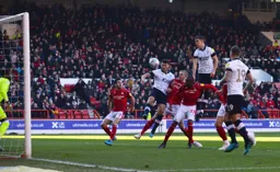 Dan Potts and Matty Pearson attack a corner