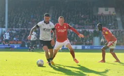 George Moncur keeping possession in the centre of the park