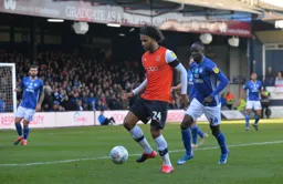 Izzy Brown bringing the ball under his spell and trying to progress it into the box