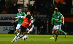 Pelly-Ruddock Mpanzu controlling the ball in midfield