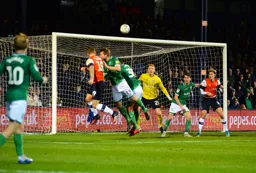 James Collins with the near post flick on from a corner