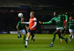 Harry Cornick receiving the ball and getting ready to test Dominic Iorfa round the box