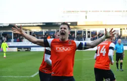 James Collins celebrates after equalising for the Town in the 90th minute