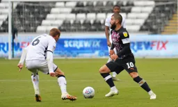 Elliot Lee looks for an opening, taking on Jay Fulton