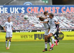 James Collins beats both Ben Cabango and Connor Roberts in the air to head the Hatters in front