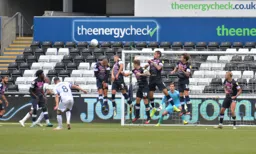 The Town defend a set piece sent in by Matt Grimes