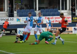 James Brees' cross is gathered by former Hatter Christian Walton with James Collins and Harry Cornick missing out