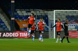 Glen Rea jumps for joy that the Hatters' Championship survival has been secured
