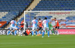 The Hatter players look on as Adam Armstrong opens the scoring in the 10th minute