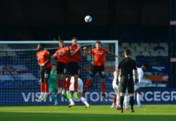 Pelly-Ruddock Mpanzu, Martin Cranie, Sonny Bradley and James Collins form a defensive wall