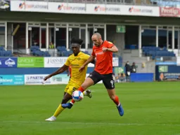 Danny Hylton attempts to brush off Anthony Stewart