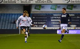 Luke Berry sends in a right wing cross