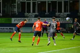Glen Rea sends a header towards goal