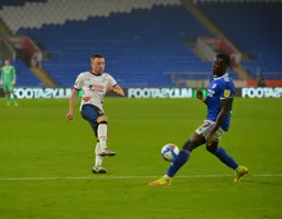 Jordan Clark`s shot is blocked by Sheyi Ojo