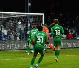 James Collins heads in his second of the afternoon