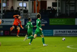 Kiernan Dewsbury-Hall gets airbourne after a shot at goal