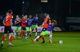 Glen Rea tussles for the ball with Han-Noah Massengo