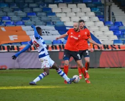 Danny Hylton is tackled by Alfa Semendo