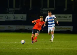 Kiernan Dewsbury-Hall lays the ball off