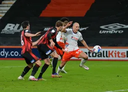 Kal Naismith moves towards the ball