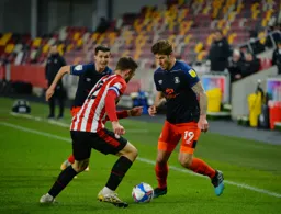 James Collins is confronted by Henrik Dalsgaard