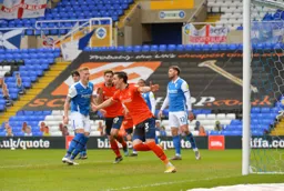 Dan Potts wheels away after scoring his goal