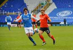 Kiernan Dewsbury-Hall bursts past Mikel San Jose