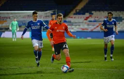 Kiernan Dewsbury-Hall takes the ball away from Harry Wilson