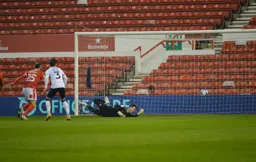 Simon Sluga ensures he keeps a clean sheet with this save