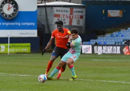 Elijah Adebayo is being held by Latibeaudiere