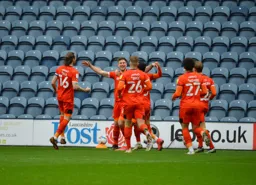 James Collins is all smiles after Town`s late winner