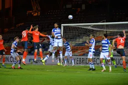 Elijah Adebayo and Glen Rea attack the Reading goal but cannot break the deadlock