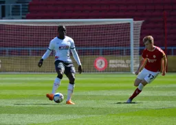 Pelly-Ruddock Mpanzu looks to start an attacking move