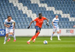 Elijah Adebayo looks to pass